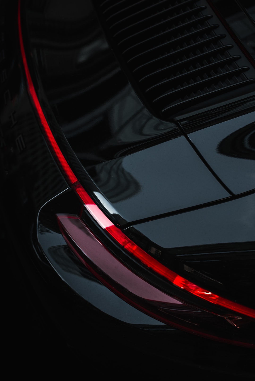 a close up of the tail lights of a car