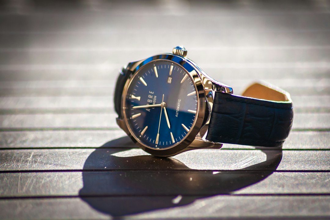 blue and gold analog watch
