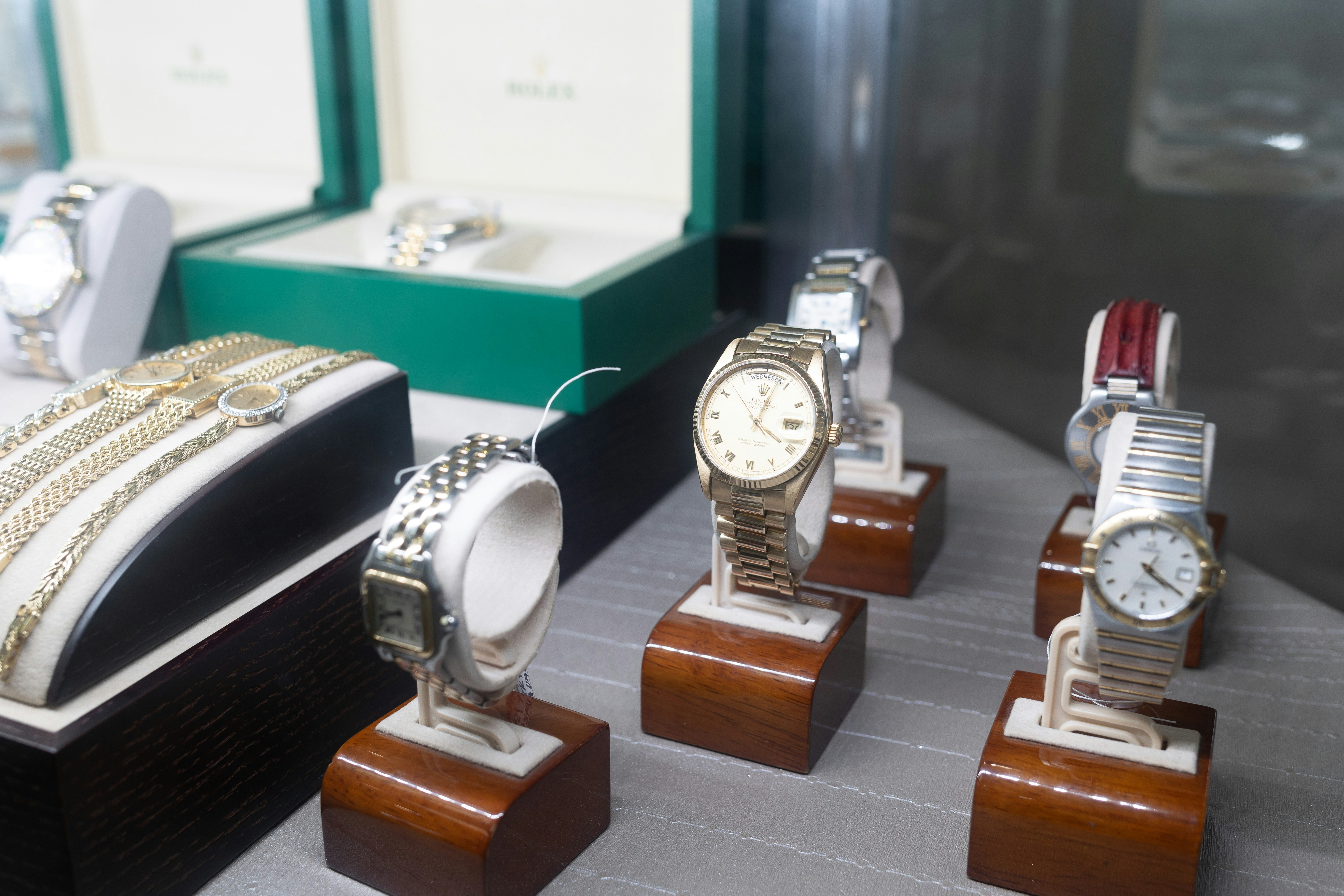 Rolex Watch by Watch Brands a bunch of watches that are sitting on a table